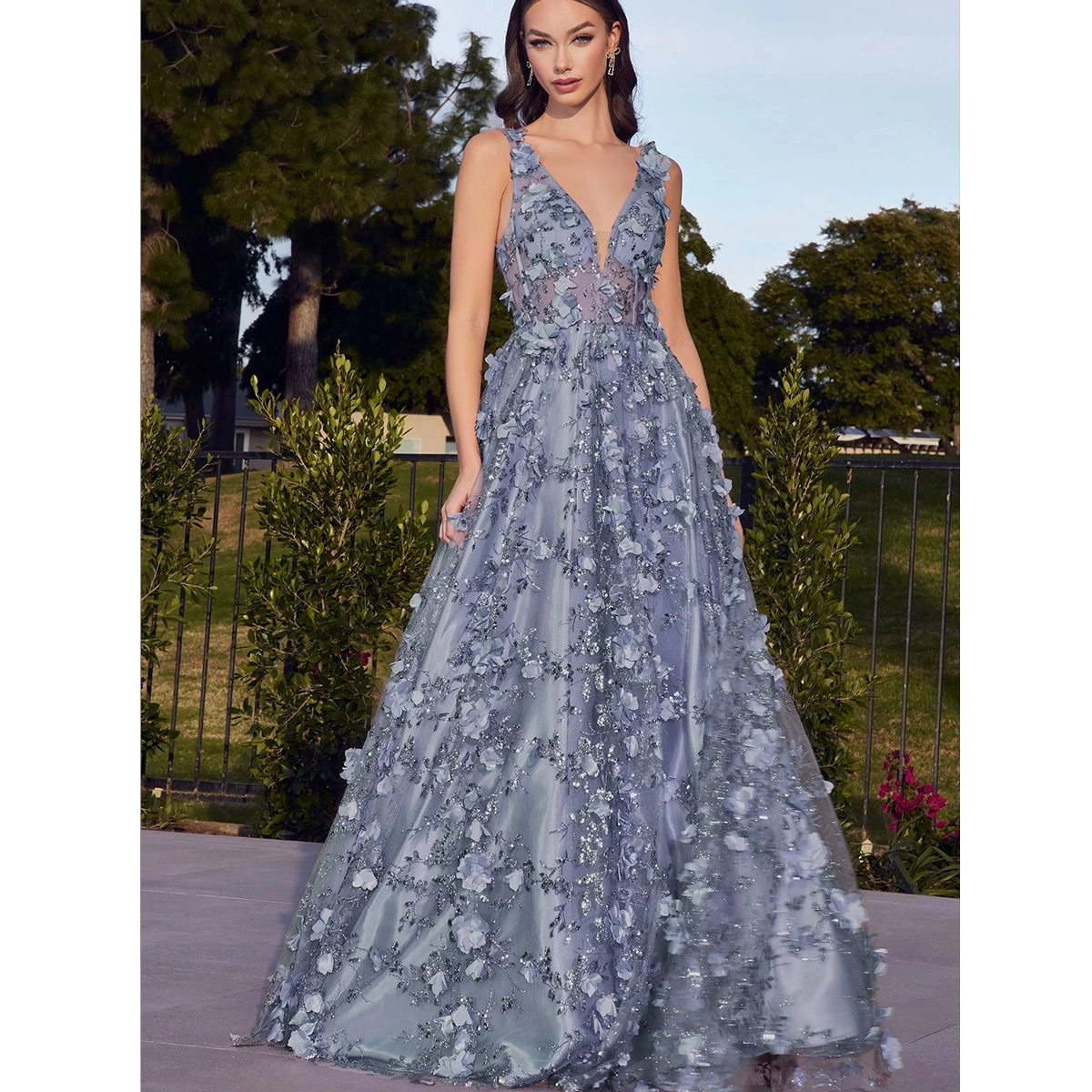 blue tulle evening gown with deep v neckline sheer mesh bodice floral appliques full length formal dress
