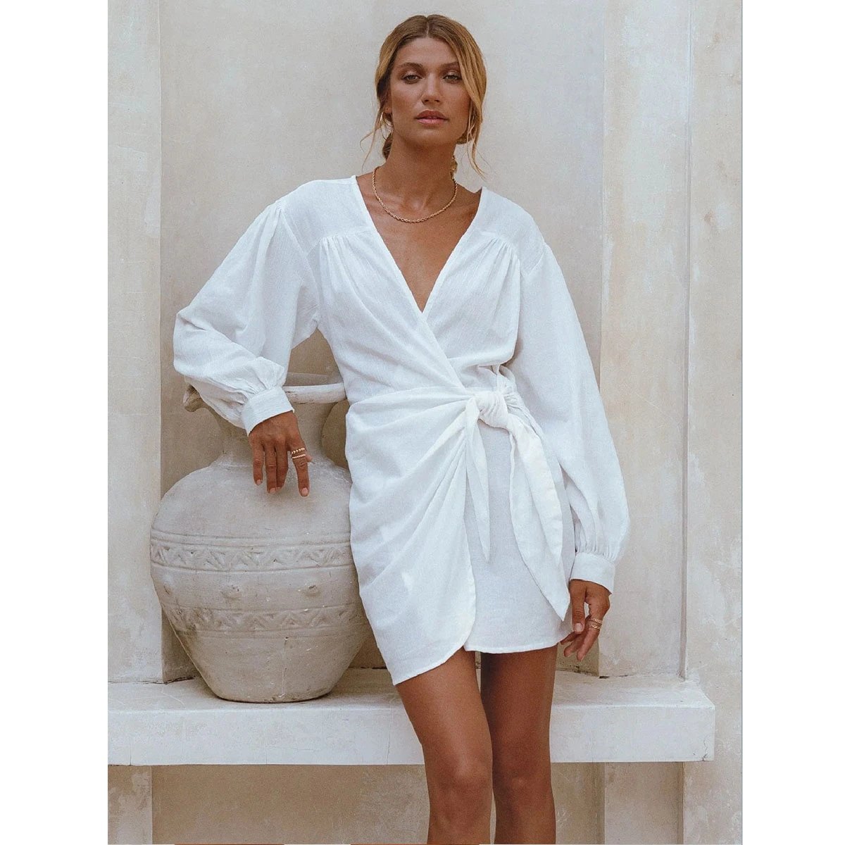 white wrap mini dress deep v neck long sleeves side tie knot irregular hem wholesale dress manufacturer