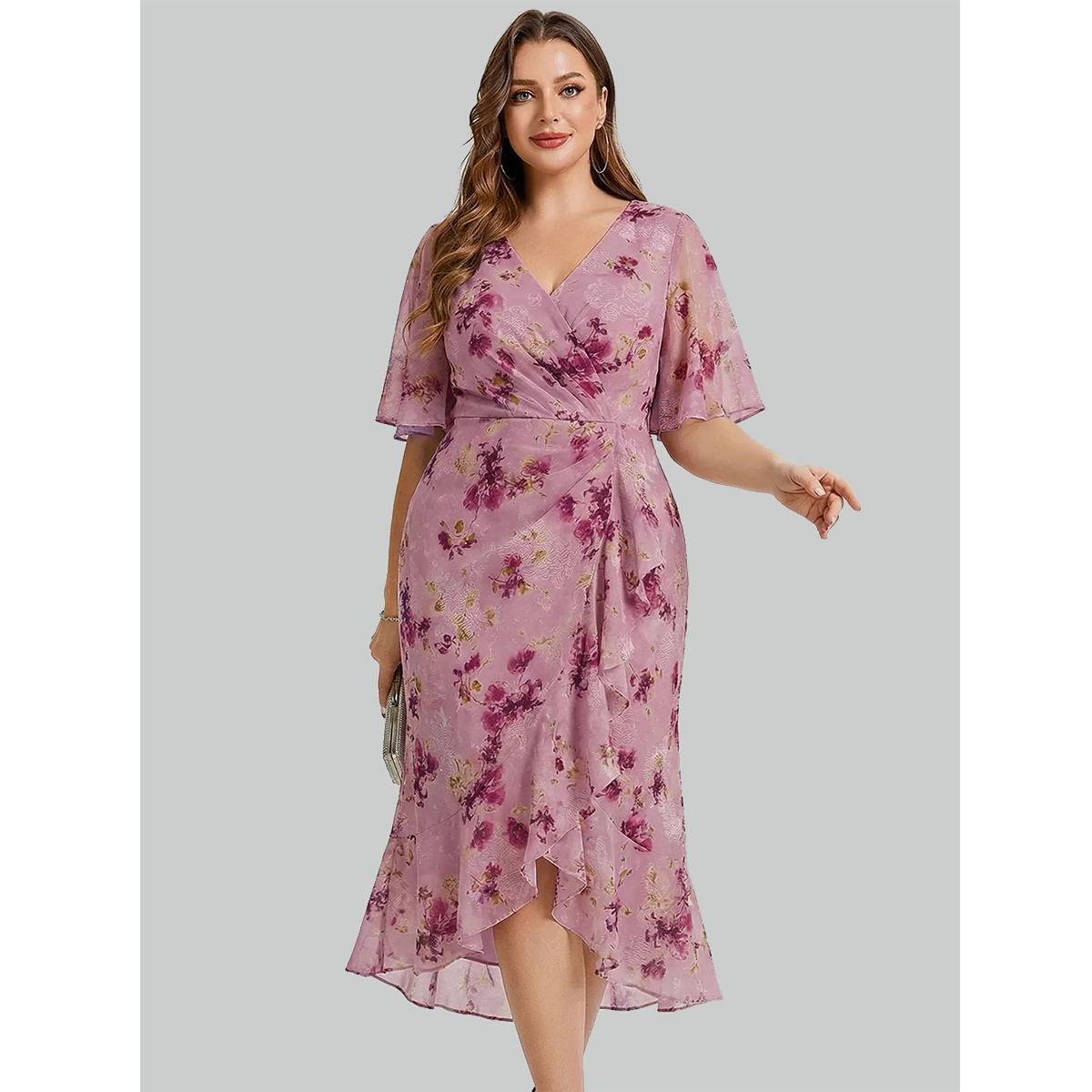 floral print plus size midi dress with v neckline wrap style bodice short sleeves and flowy high low hem