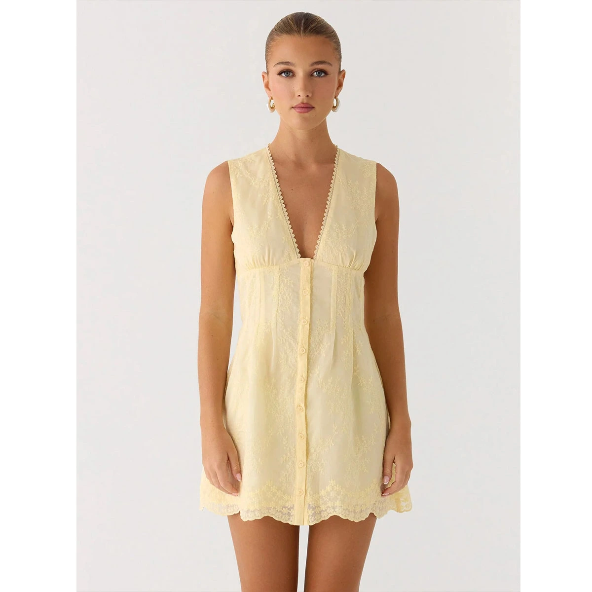 yellow boho mini dress with v neckline front buttons fitted waist adjustable back straps