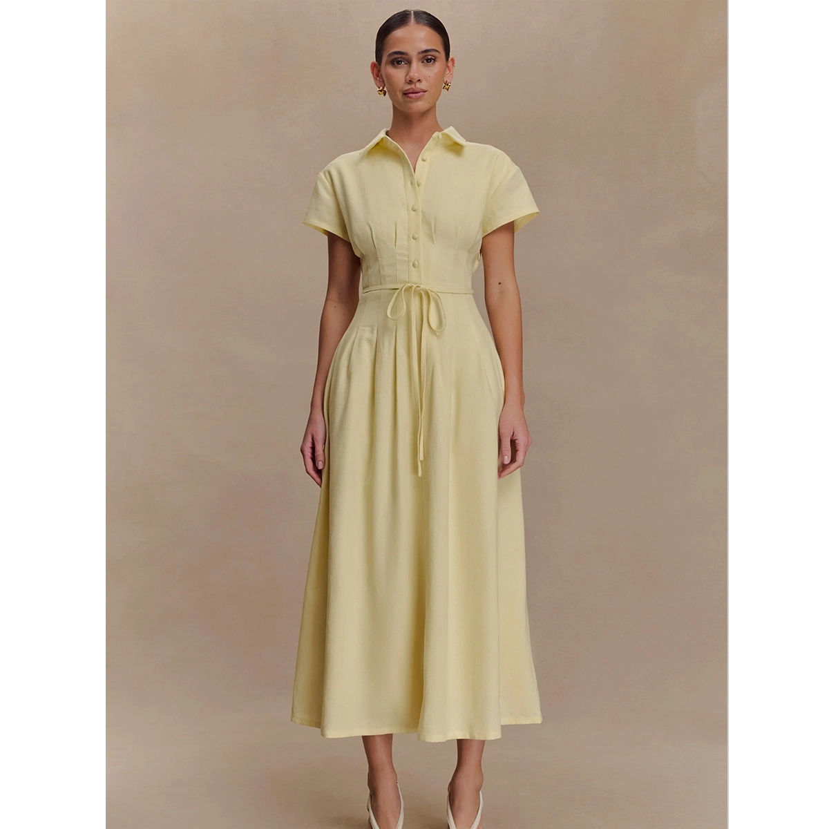 linen midi dress with collared neck short sleeves button front fitted waist tucks tie belt and a line fit