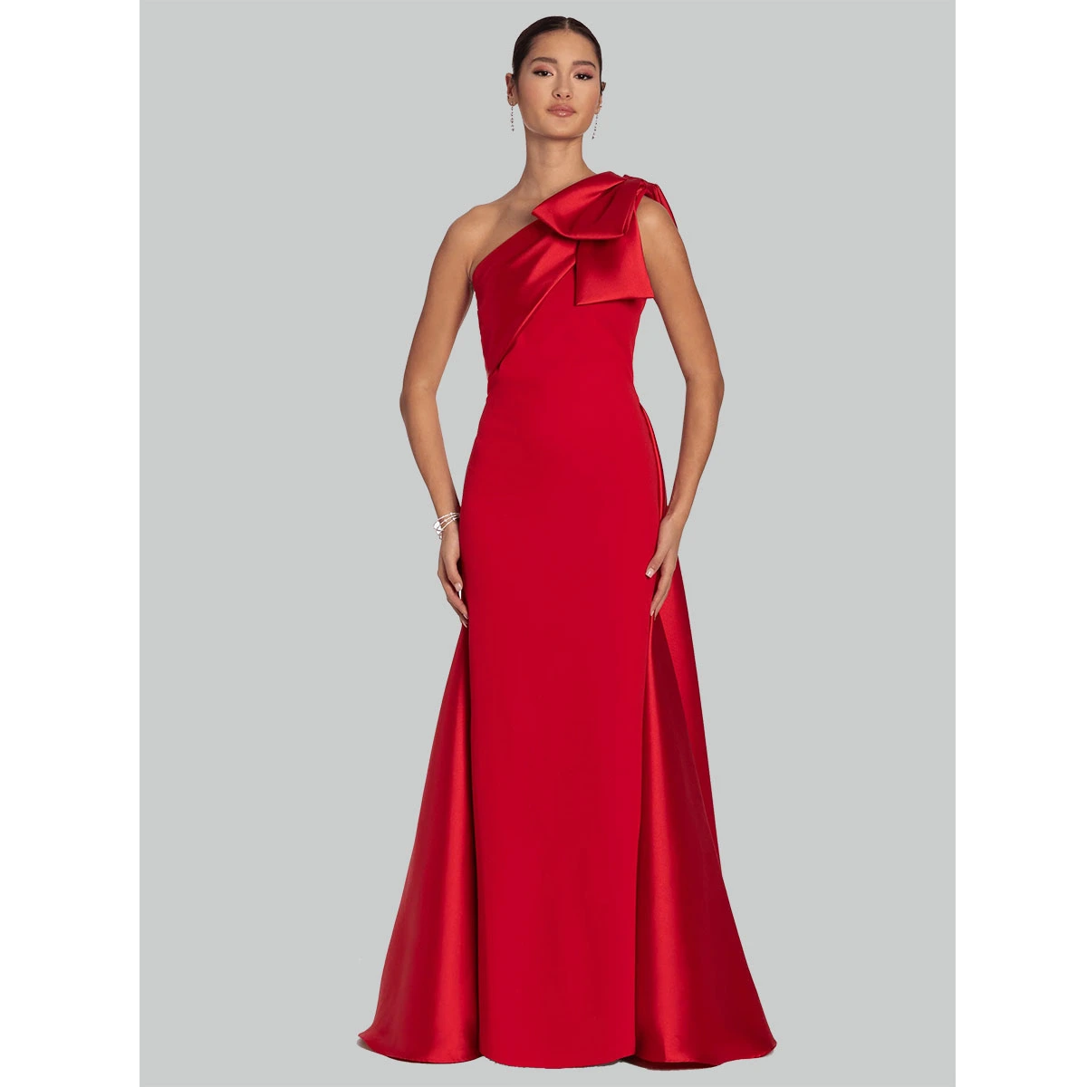 red satin evening dress with one shoulder bow detail fitted silhouette flared floor length hem formal gown
