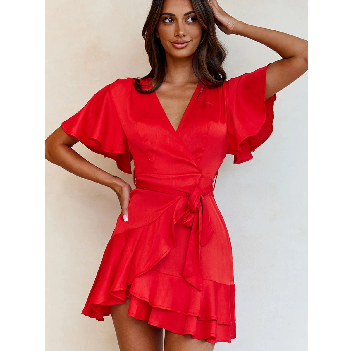 red satin wrap mini dress deep v neckline short sleeves self tie waist layered ruffle hem party dress