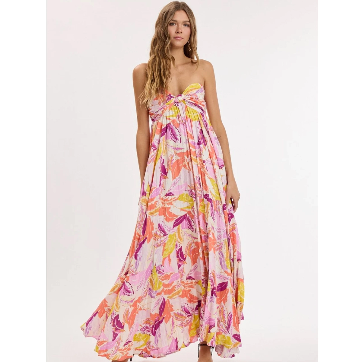 pink print boho wedding guest dress with sweetheart neckline twisted knot bodice empire waist high low ruffle hem maxi length dress manufacturer wholesale supplier