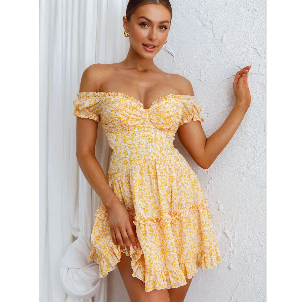 yellow floral off shoulder mini dress with sweetheart neckline frill trim cutout back ruffle hem