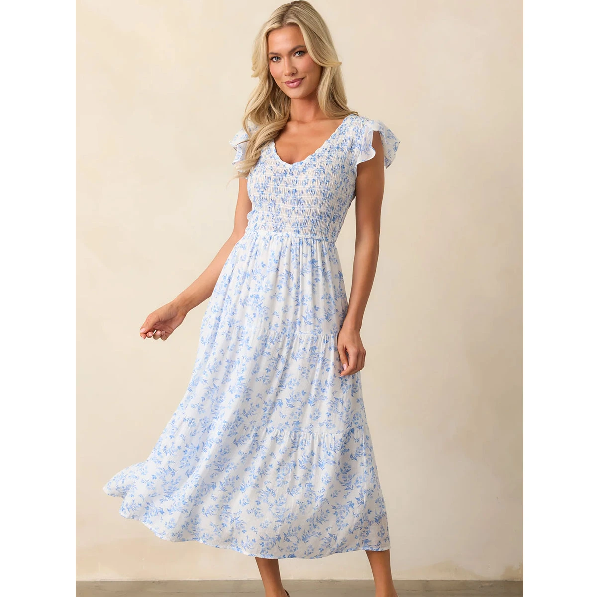 blue floral smocked maxi dress v neckline smocked bust ruffle cap sleeves tiered skirt summer dress