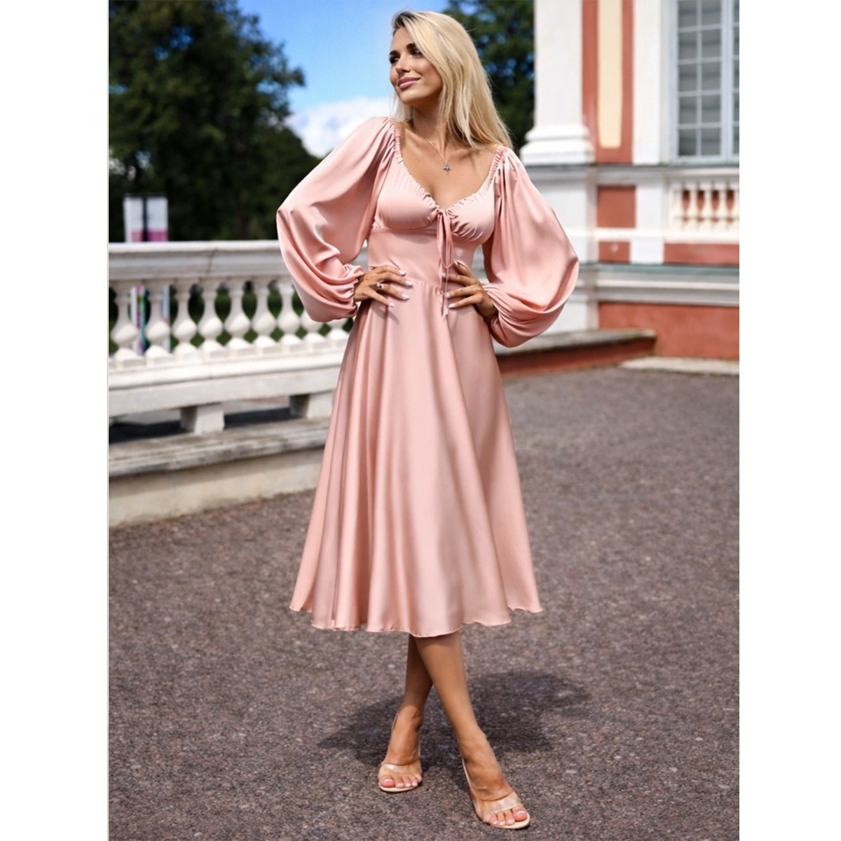 pink silk midi dress with tie bust puff long sleeves silky fabric and flared midi skirt