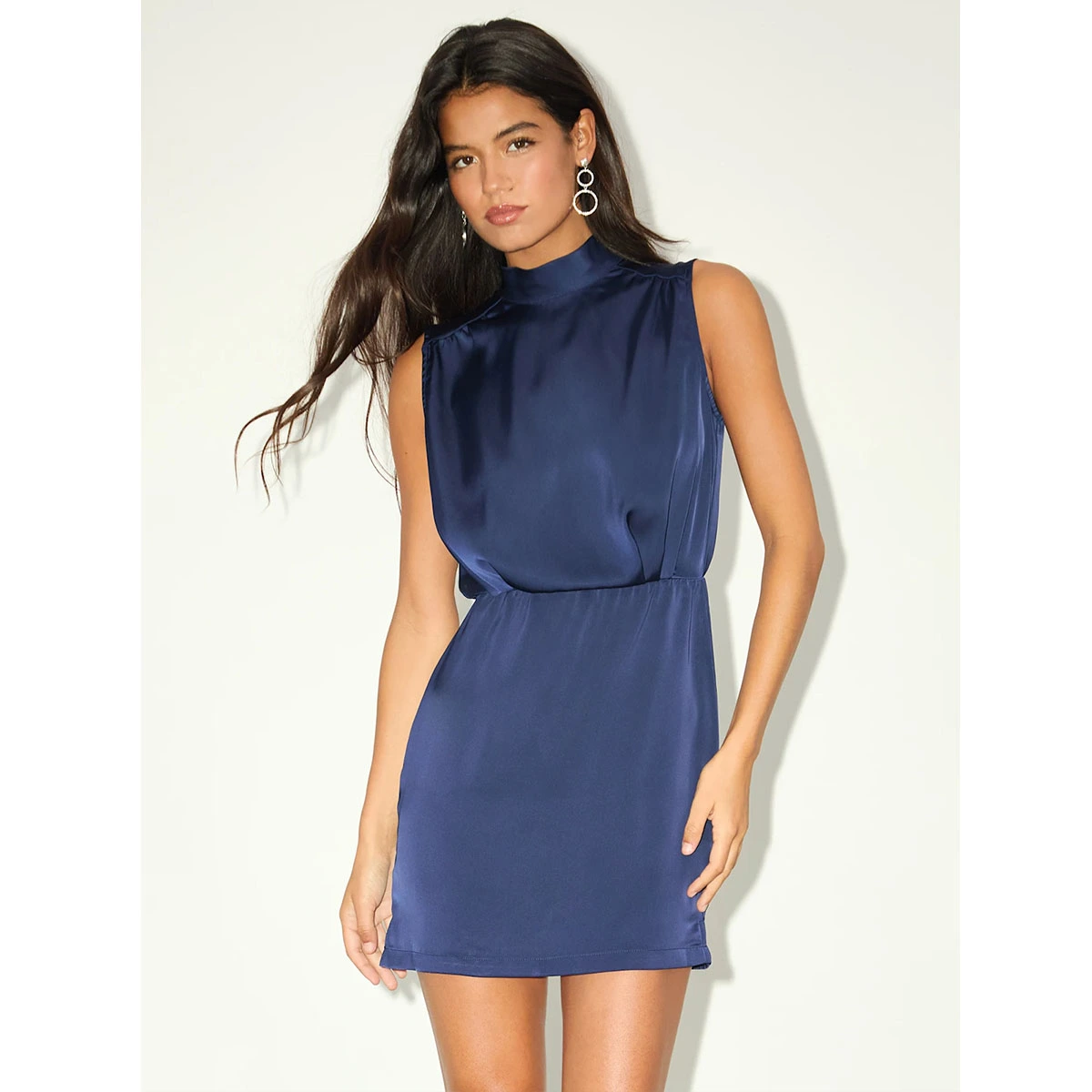 navy silk satin sleeveless mock neck mini dress with draped waist flowing hem side slits