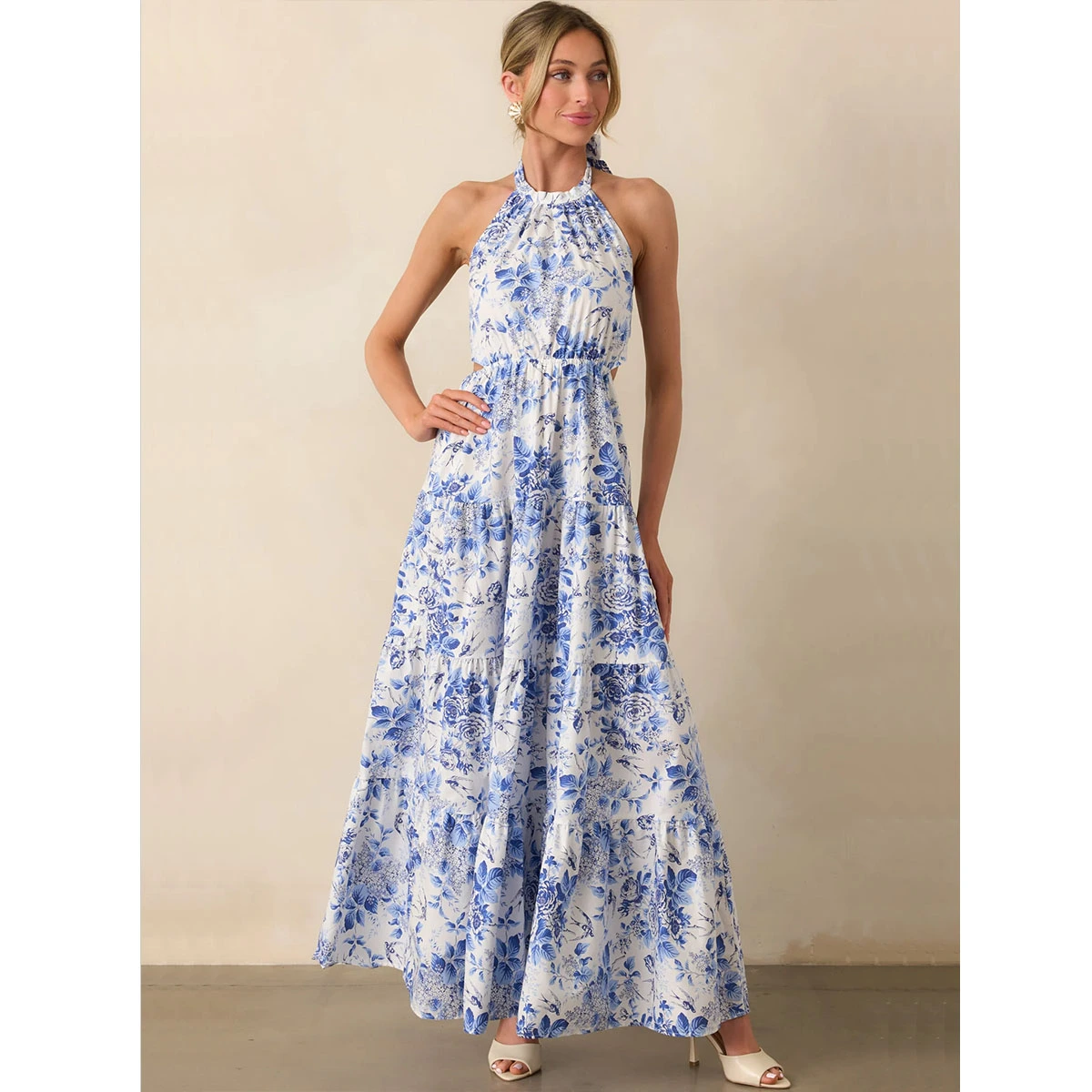 blue floral print halter dress with self tie neckline bow back elastic waistband side cutout tiered skirt