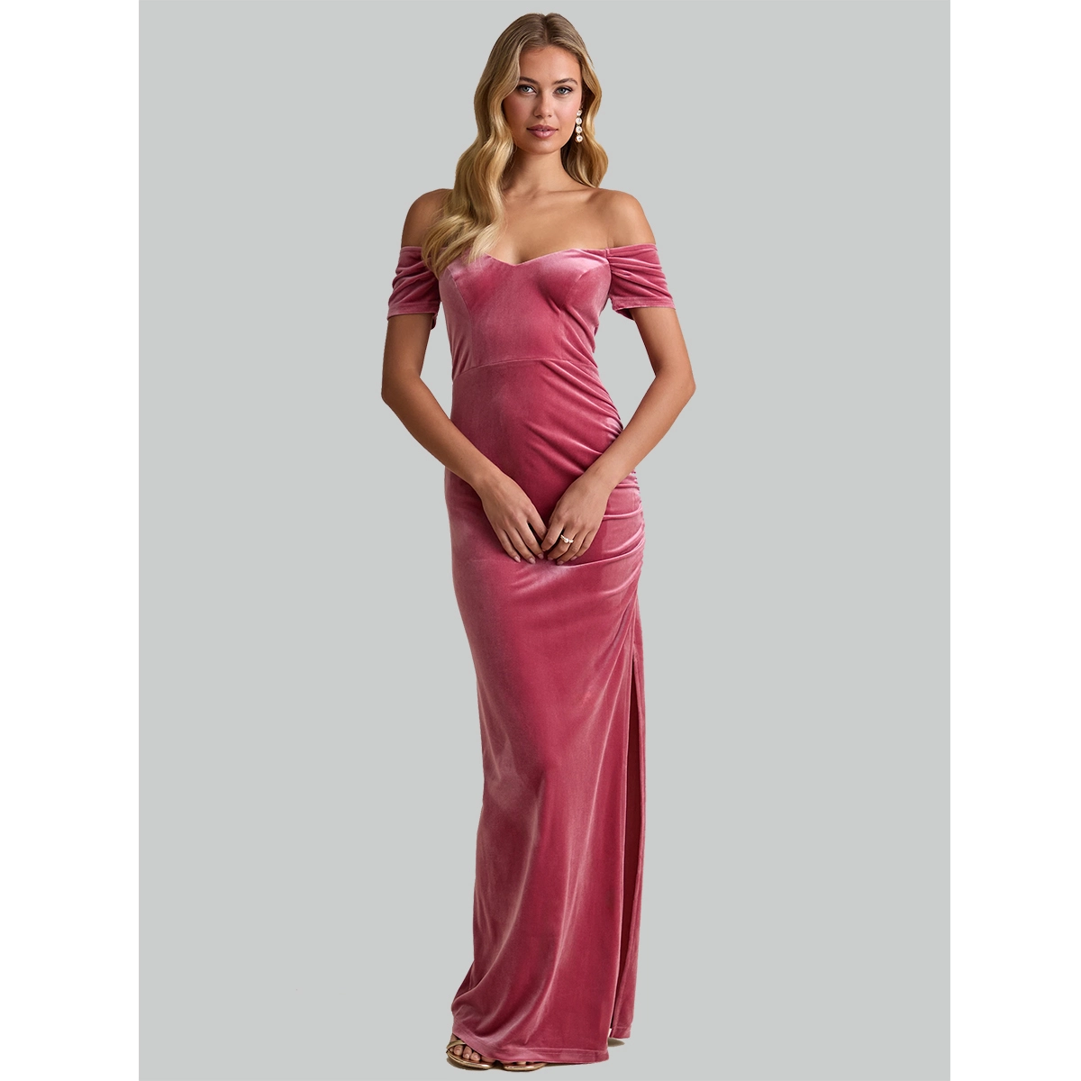 dusty pink velvet off shoulder evening gown with short ruched sleeves side ruching and high side slit