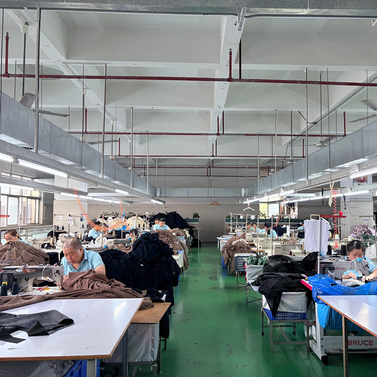 in-house sewing room for custom dress wholesale production